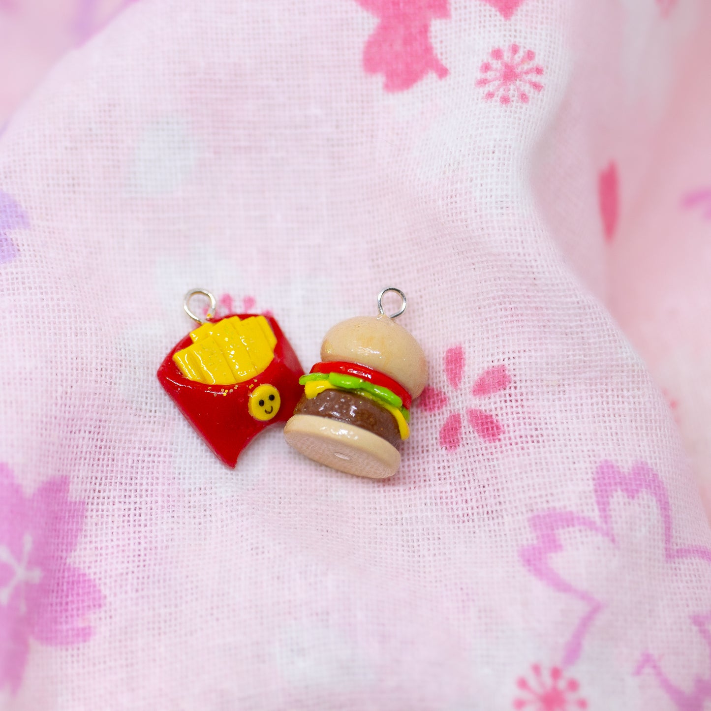 Handmade polymer clay burger and french fry charms. Available as a phone charm or pair of earrings. The perfect matching friendship charms for you and someone you love.