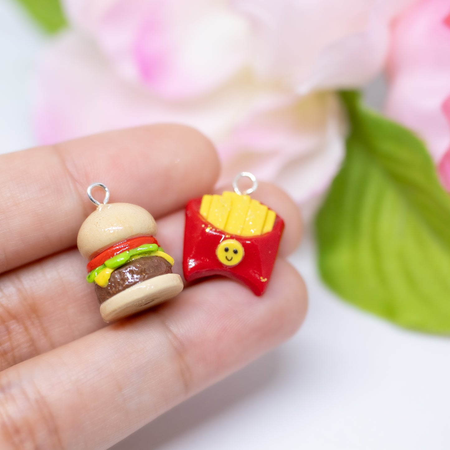 Handmade polymer clay burger and french fry charms. Available as a phone charm or pair of earrings. The perfect matching friendship charms for you and someone you love.