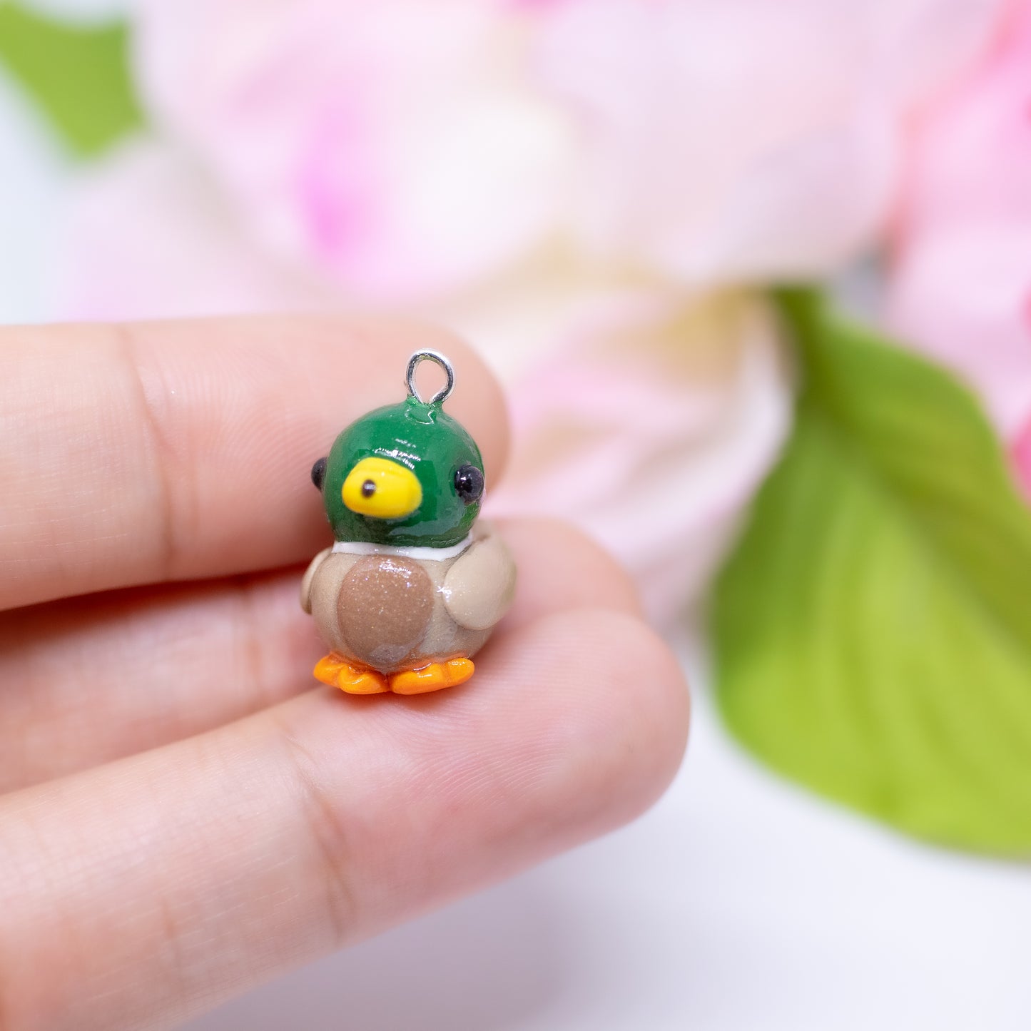 Handmade polymer clay mallard duck charms. Available as a charm or as a pair of earrings.