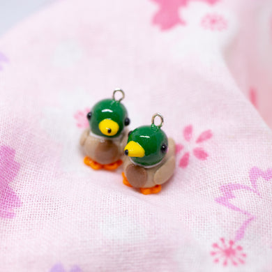Handmade polymer clay mallard duck charms. Available as a charm or as a pair of earrings. 