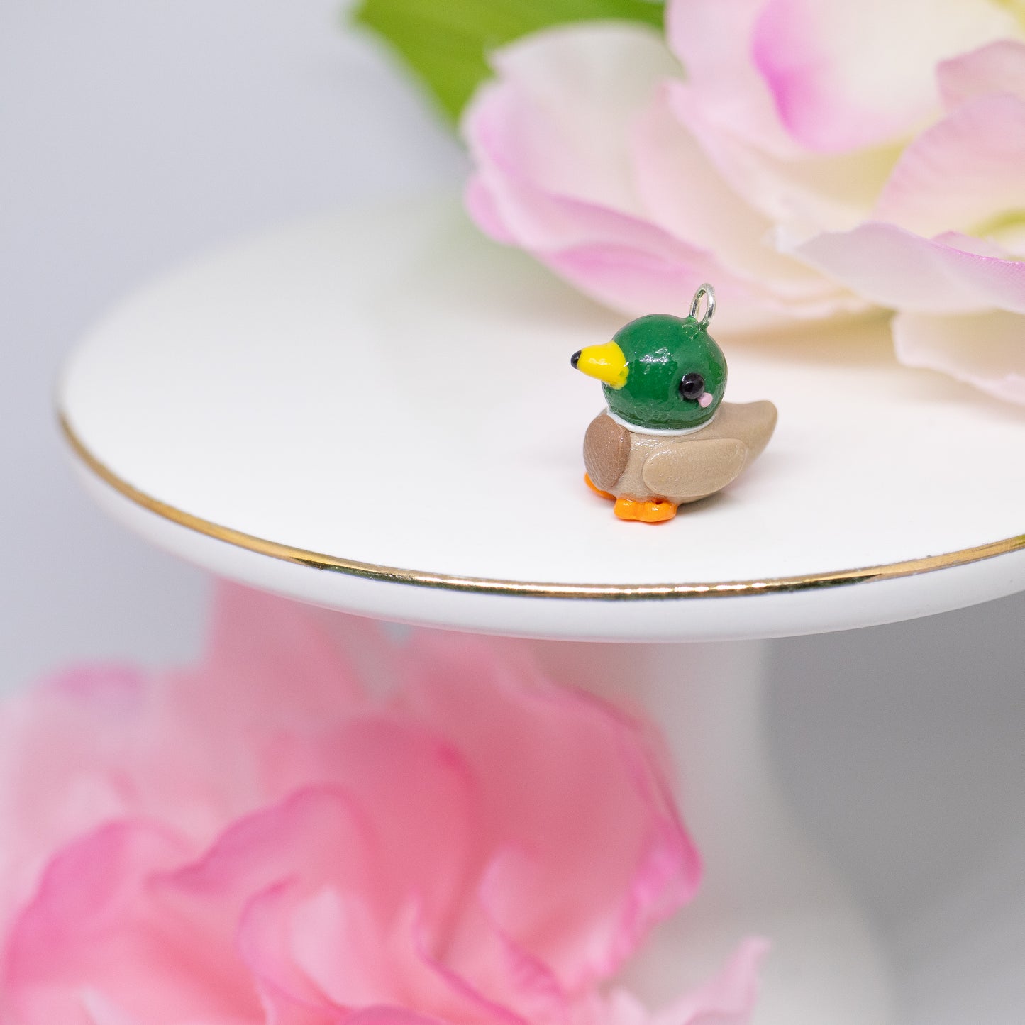 Handmade polymer clay mallard duck charms. Available as a charm or as a pair of earrings.