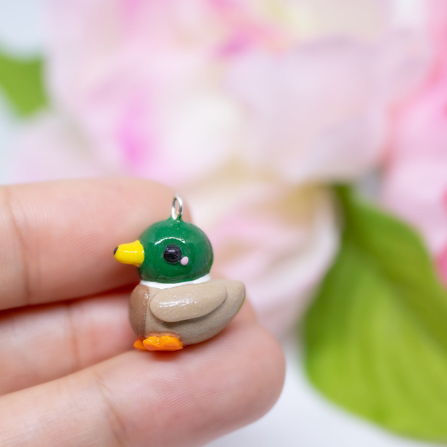 Handmade polymer clay mallard duck charms. Available as a charm or as a pair of earrings.
