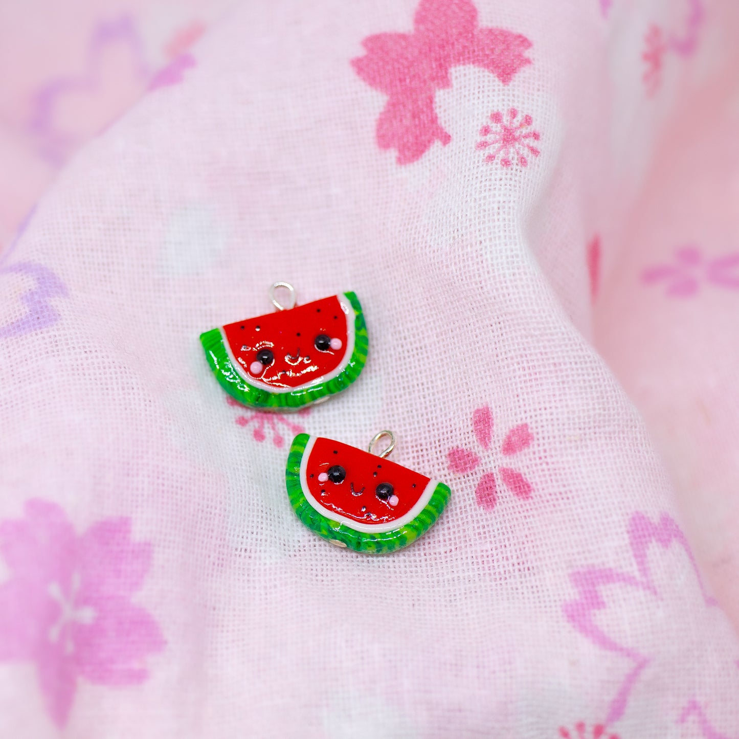 Handmade polymer clay watermelon charms. Available as a charm or as a pair of earrings.