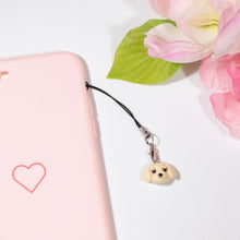 Load image into Gallery viewer, A cute, simple golden retriever dog charm! This little dog has blushing cheeks and sweet, expressive eyebrows. Golden retriever dogs are well known for their gentleness and affectionate nature.
