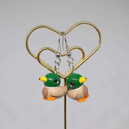 Handmade polymer clay mallard duck charms. Available as a charm or as a pair of earrings. 