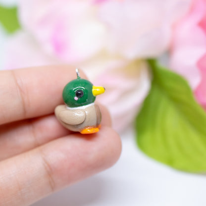 Handmade polymer clay mallard duck charms. Available as a charm or as a pair of earrings. 