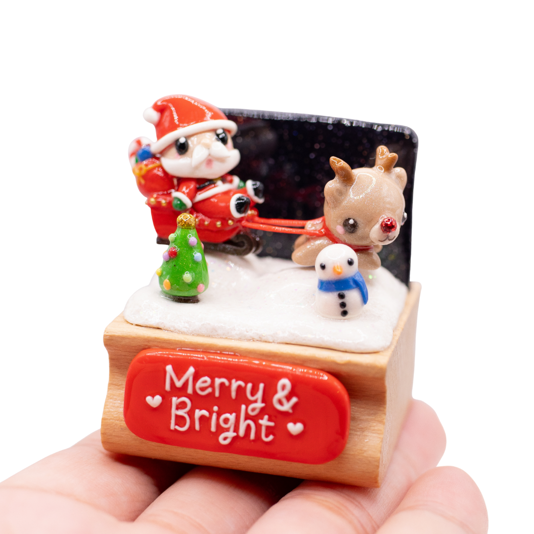 Merry & Bright Santas Sleigh + Rudolph Figurine
