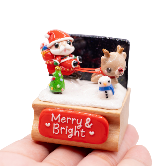 Merry & Bright Santas Sleigh + Rudolph Figurine