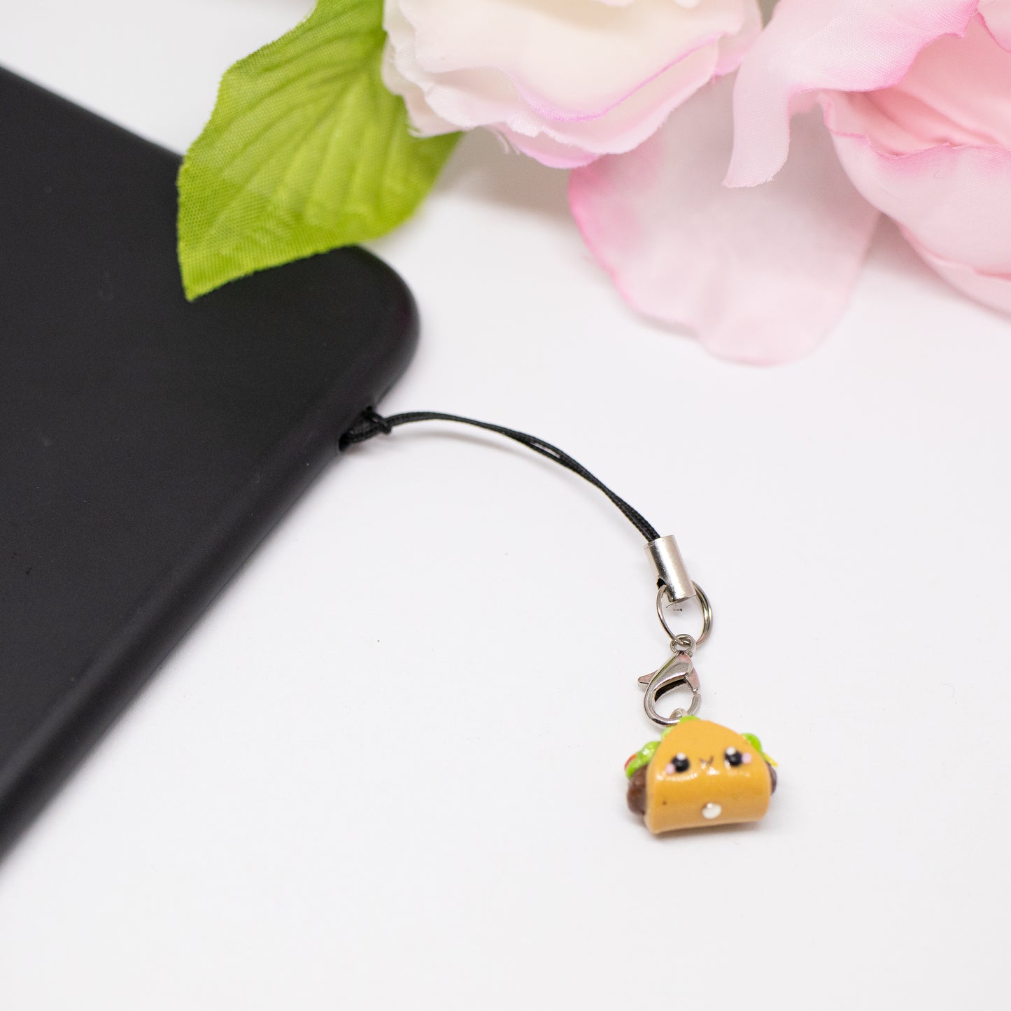 Handmade polymer clay taco charms. Available as a phone charm or pair of earrings. This little taco has a cute smiling face with a lot of toppings like tomatio, cheese and lettuce.