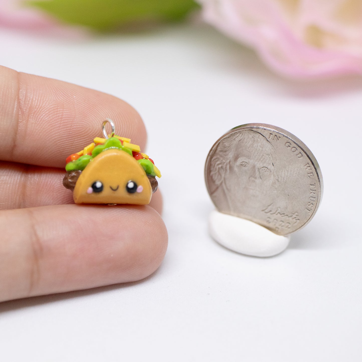 Handmade polymer clay taco charms. Available as a phone charm or pair of earrings. This little taco has a cute smiling face with a lot of toppings like tomatio, cheese and lettuce.