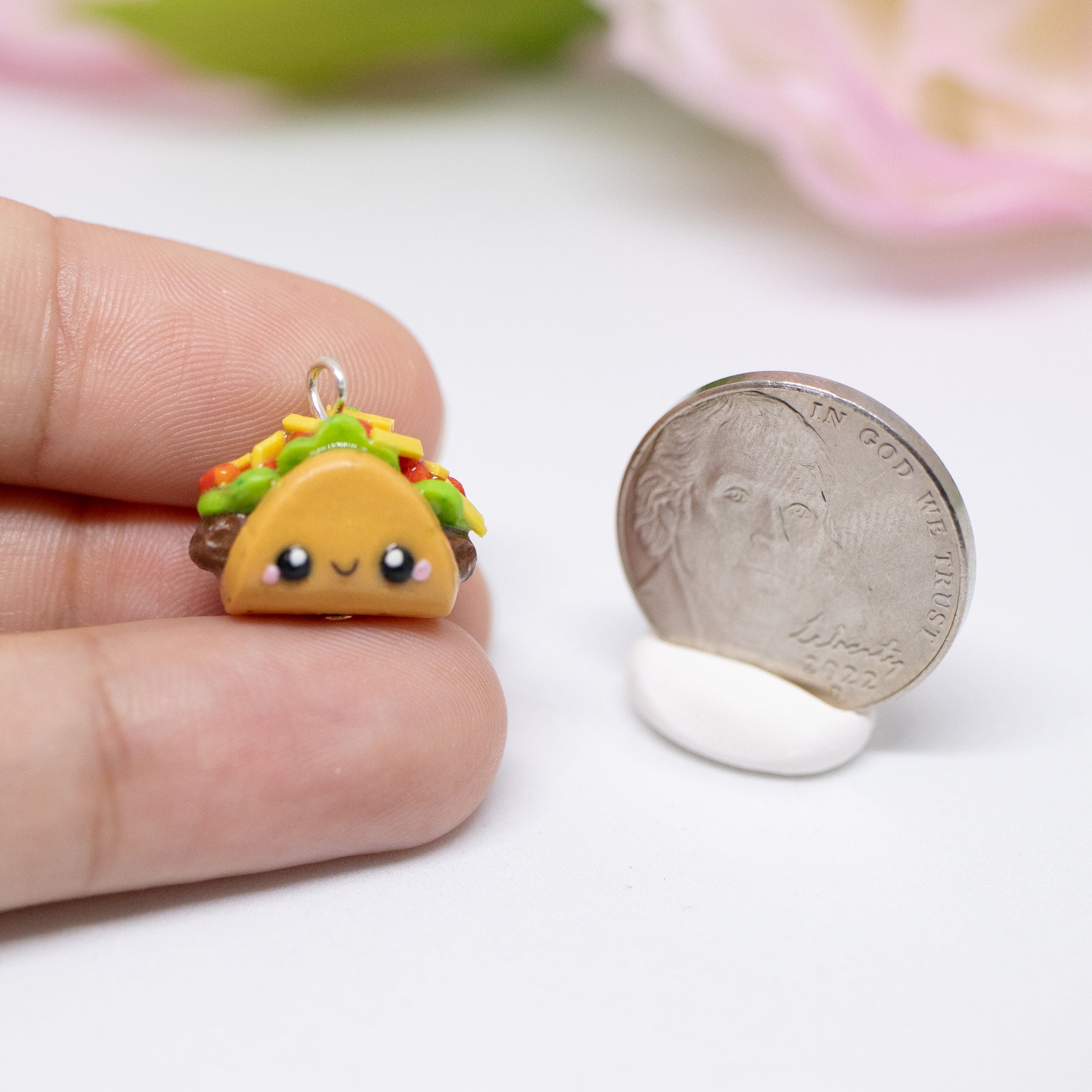 Handmade polymer clay taco charms. Available as a phone charm or pair of earrings. This little taco has a cute smiling face with a lot of toppings like tomatio, cheese and lettuce.