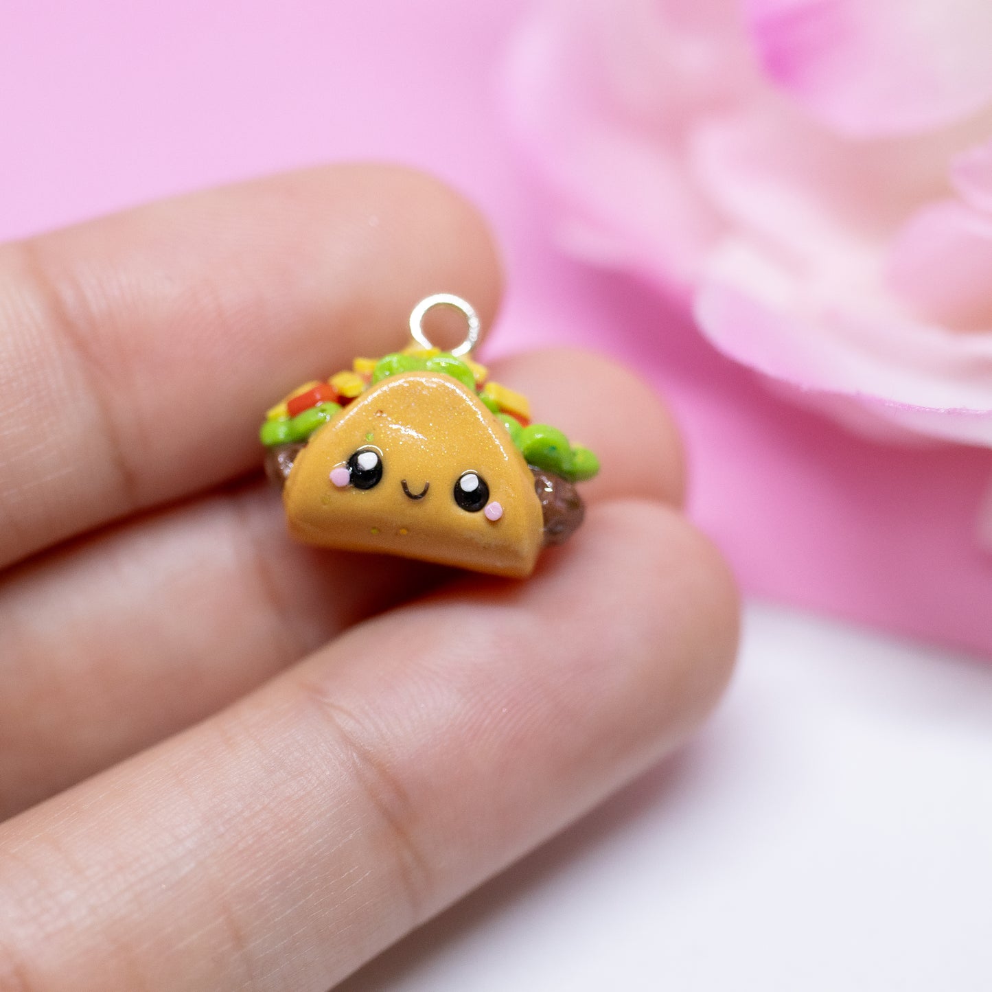 Handmade polymer clay taco charms. Available as a phone charm or pair of earrings. This little taco has a cute smiling face with a lot of toppings like tomatio, cheese and lettuce.