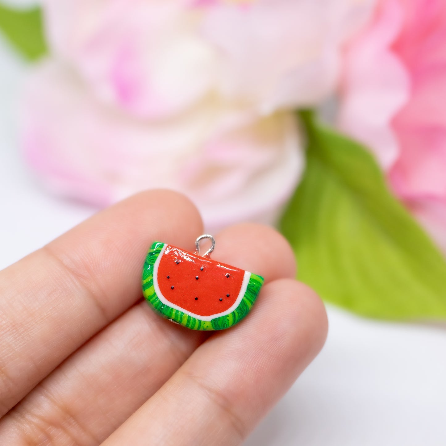 Handmade polymer clay watermelon charms. Available as a charm or as a pair of earrings. 