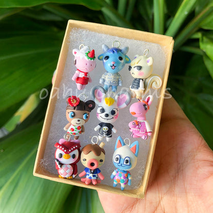 Adorable and tiny animal cossing villager charms. There's 9 villager charms in this photo.