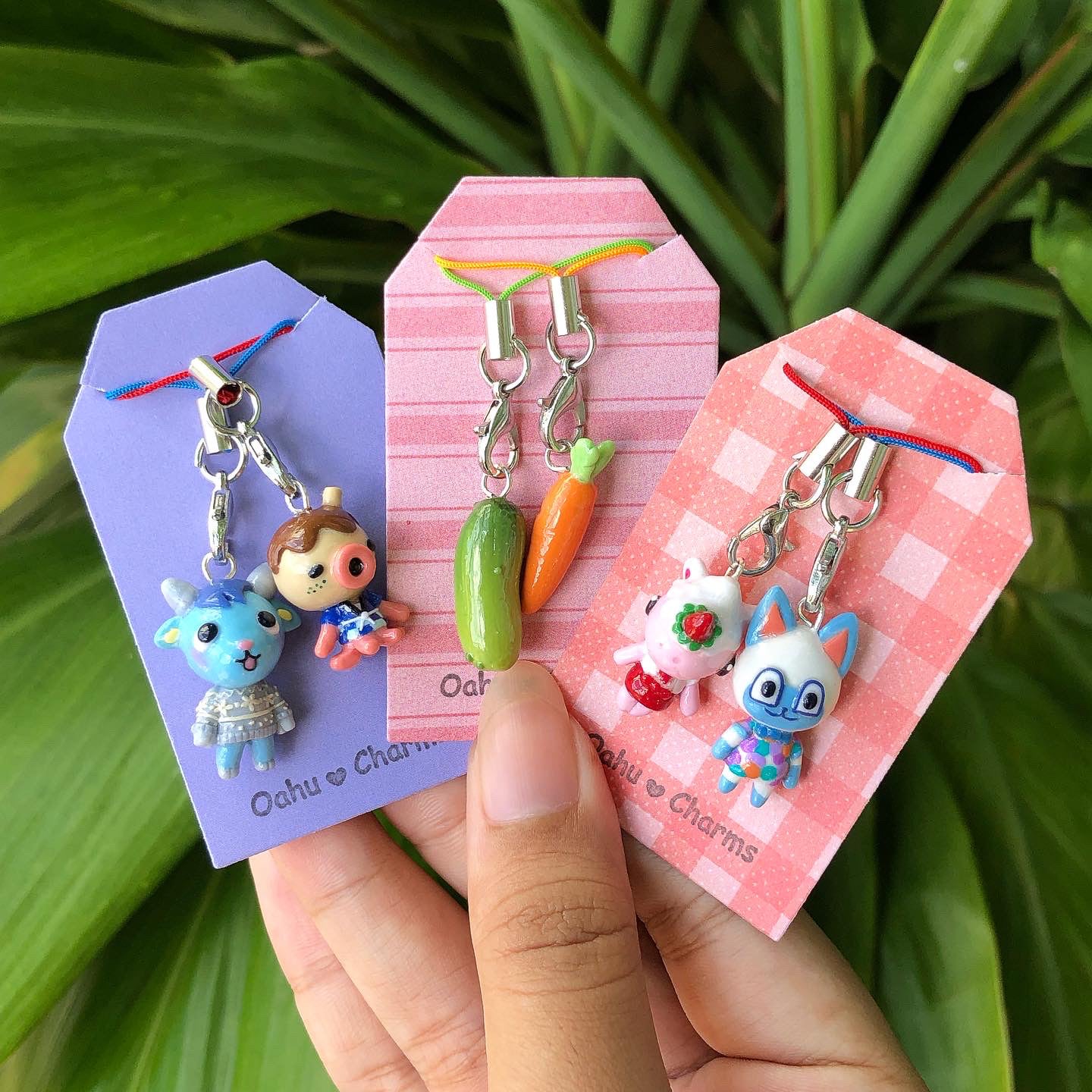 Adorable and tiny animal cossing villager charms. There's 4 villager charms in this photo.