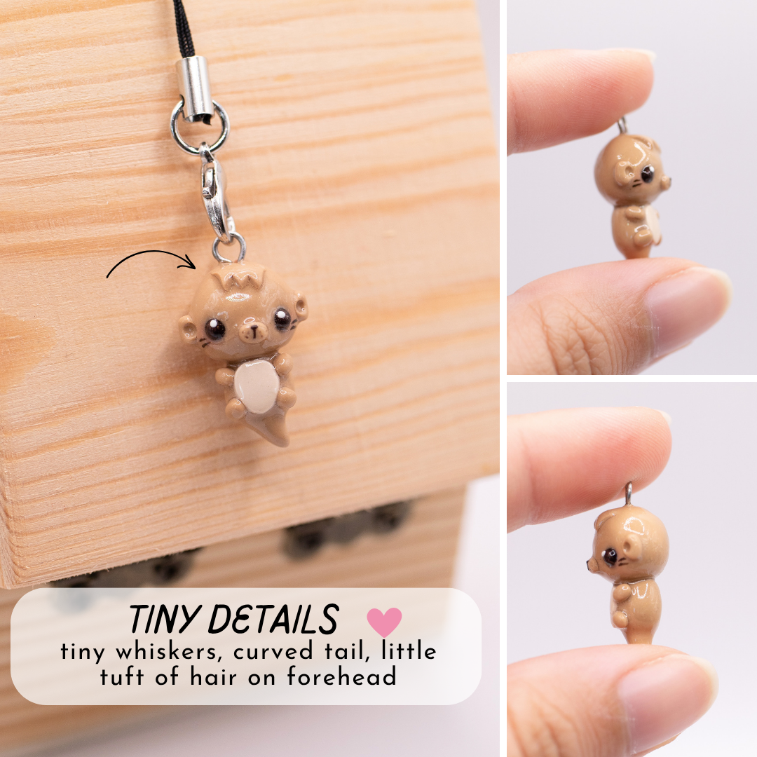 This picture is a collage of 3 images; each one showing a different angle of a otter polymer clay charm. The text on this image says "Tiny Details: tiny whiskers, curved tail, little tuft of hair on forehead"