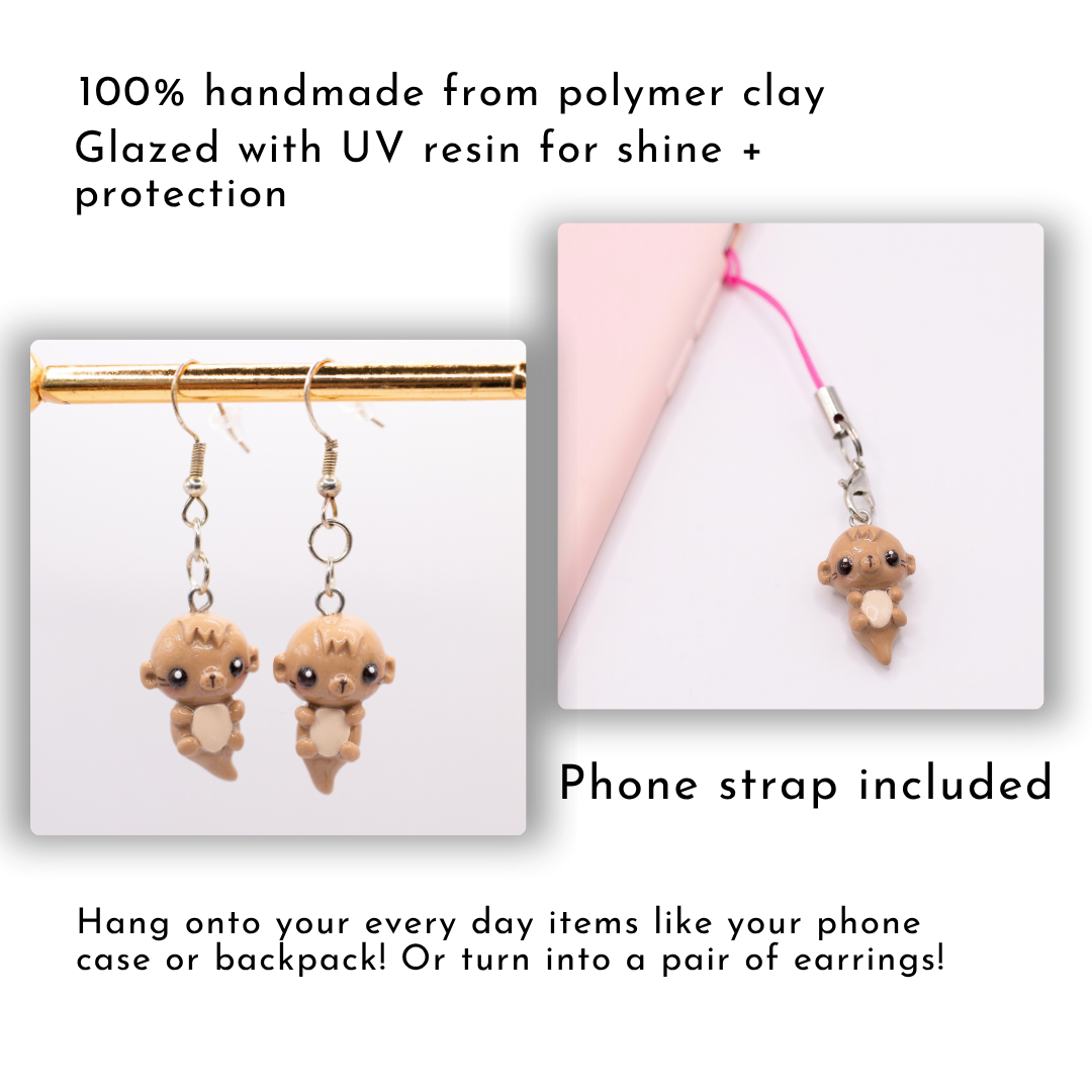 This picture has two photos of otter polymer clay charms and how they can be used: as earrings and a phone charm. The text on this image says "100% handmade from polymer clay, Glazed with UV resin for shine + protection" and "phone strap included, Hang onto your every day items like your phone case or backpack! Or turn into a pair of earrings!"