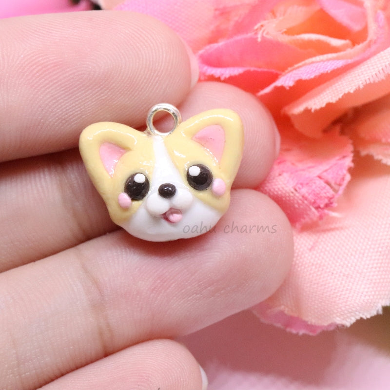 A simple pembroke welsh corgi charm! 🐾 This corgi charm has lots of cute, tiny details like pink blush and tongue. Size: 0.5" tall x 0.75" wide