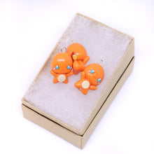 Load image into Gallery viewer, Orange Fire Dino Polymer Clay Charm
